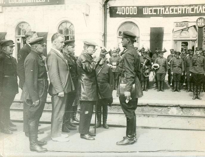 Soviet leader Mikhail Kalinin is welcomed by local officials and military personnel at Chelyabinsk railway station during a ceremonial visit on June 1, 1933.